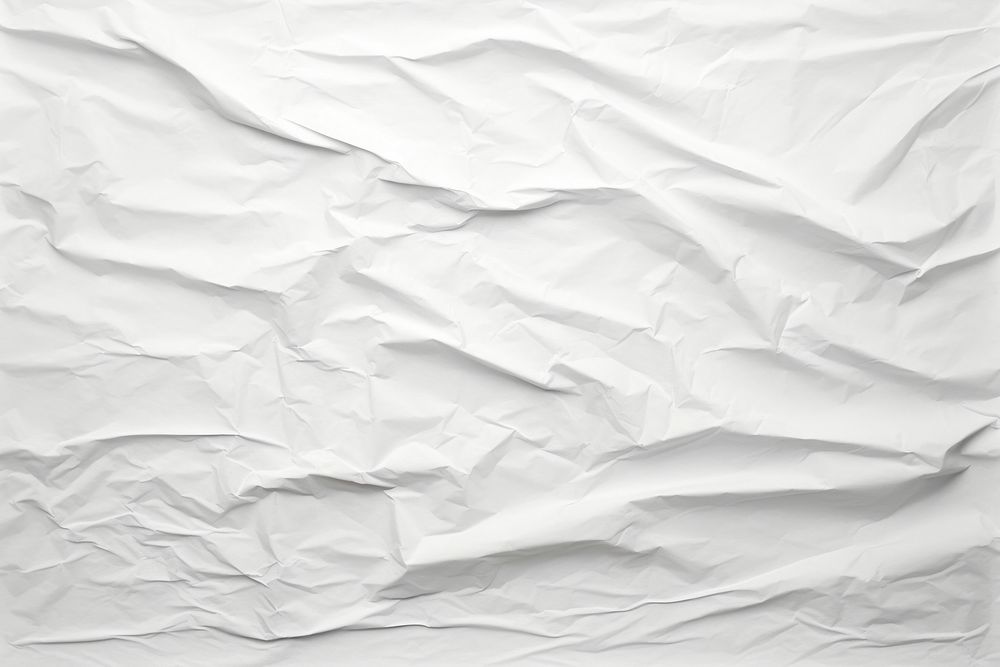 A crumpled sheet of paper on a white background backgrounds monochrome textured. AI generated Image by rawpixel.