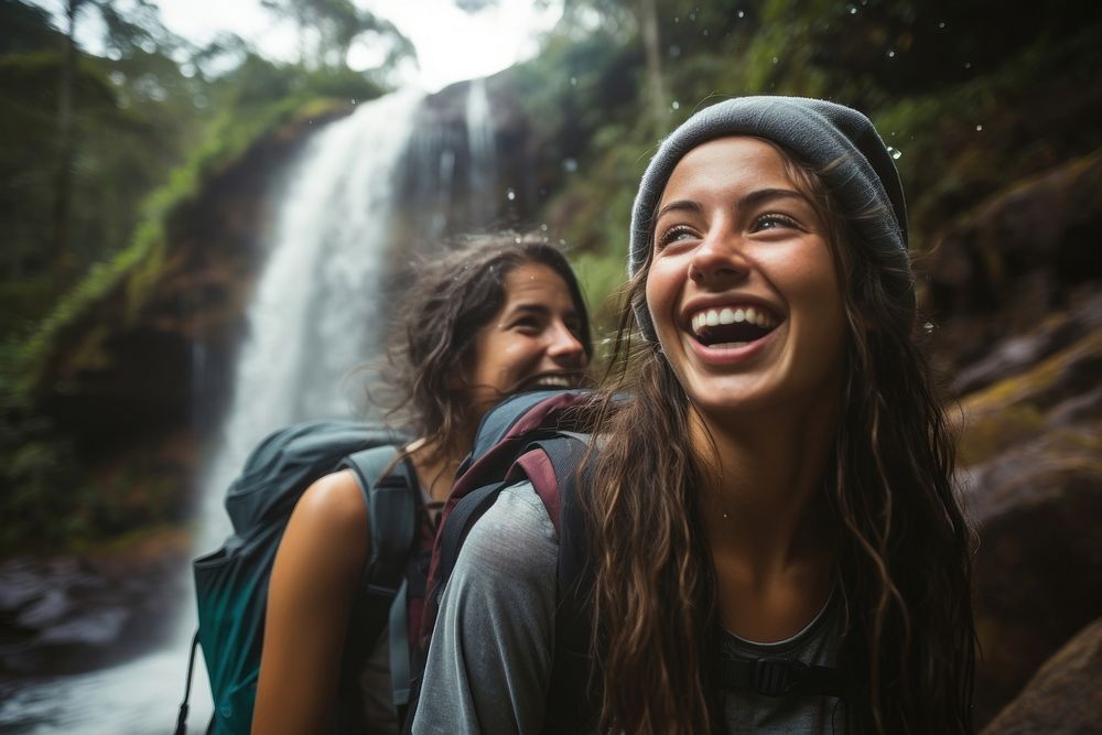 Waterfall laughing outdoors backpack. AI generated Image by rawpixel.