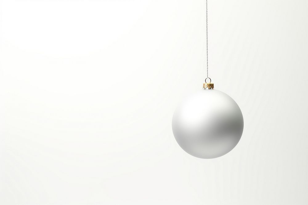 Christmas ball hanging at a rope christmas white illuminated. AI generated Image by rawpixel.