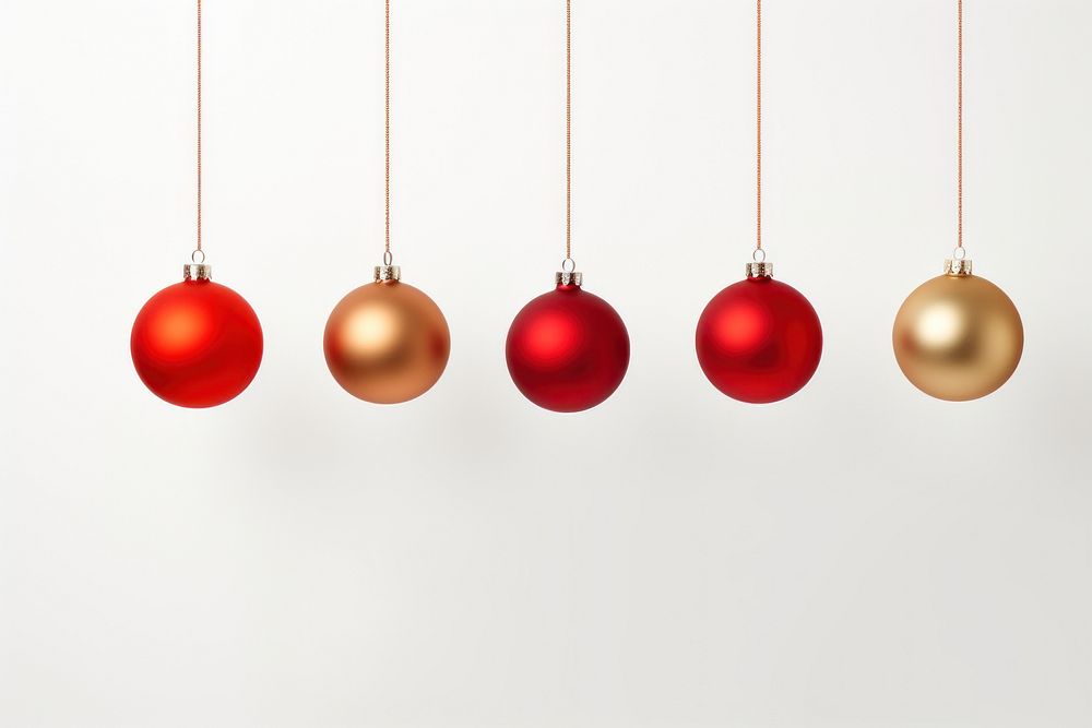 Christmas balls hanging at a rope christmas lighting white background. AI generated Image by rawpixel.