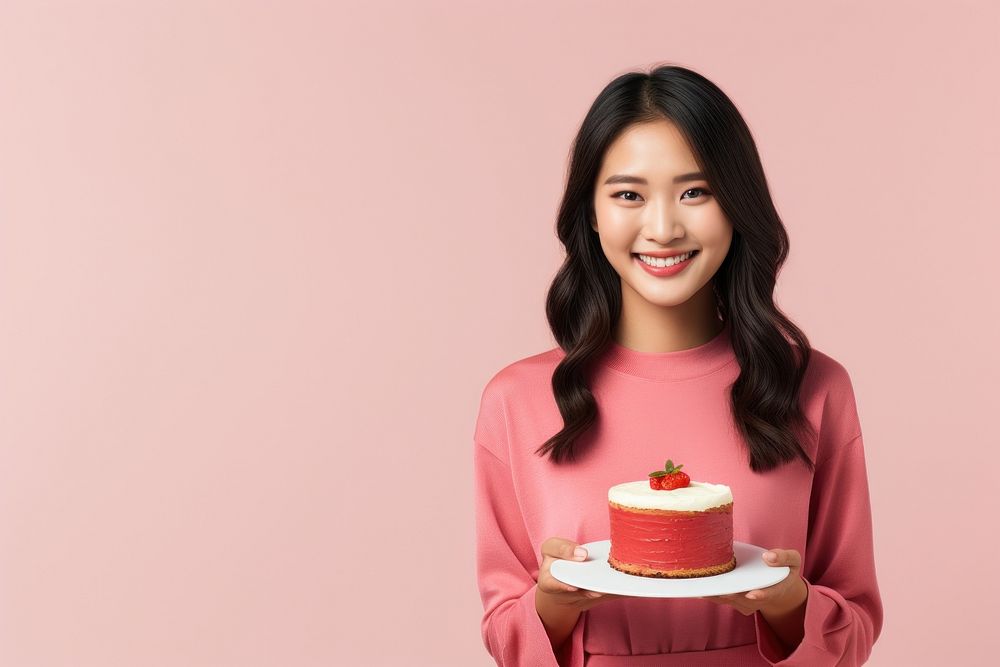 Japanese girl cake dessert holding. AI generated Image by rawpixel.
