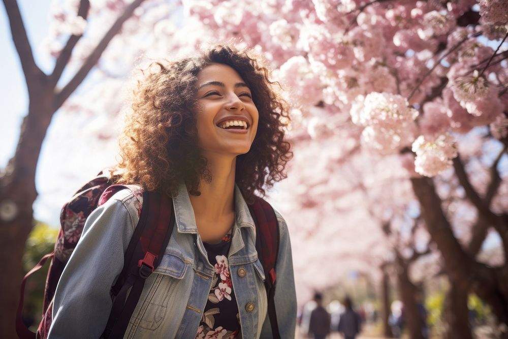 Blossom laughing outdoors smiling. AI generated Image by rawpixel.