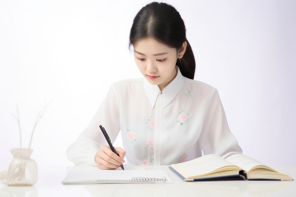 Chinese student preparing for examination publication writing reading. AI generated Image by rawpixel.