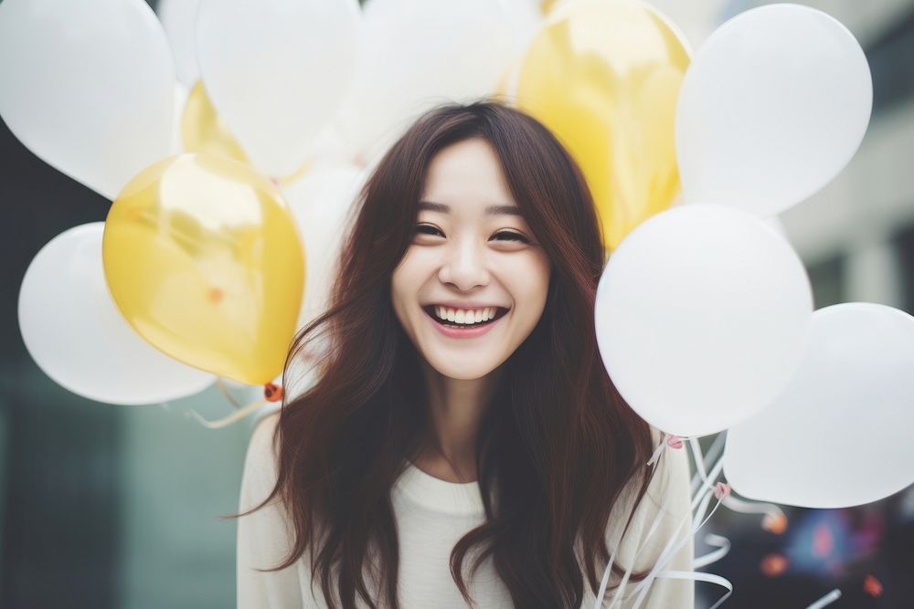 Vietnamese girl celebrate party laughing balloon smile. AI generated Image by rawpixel.