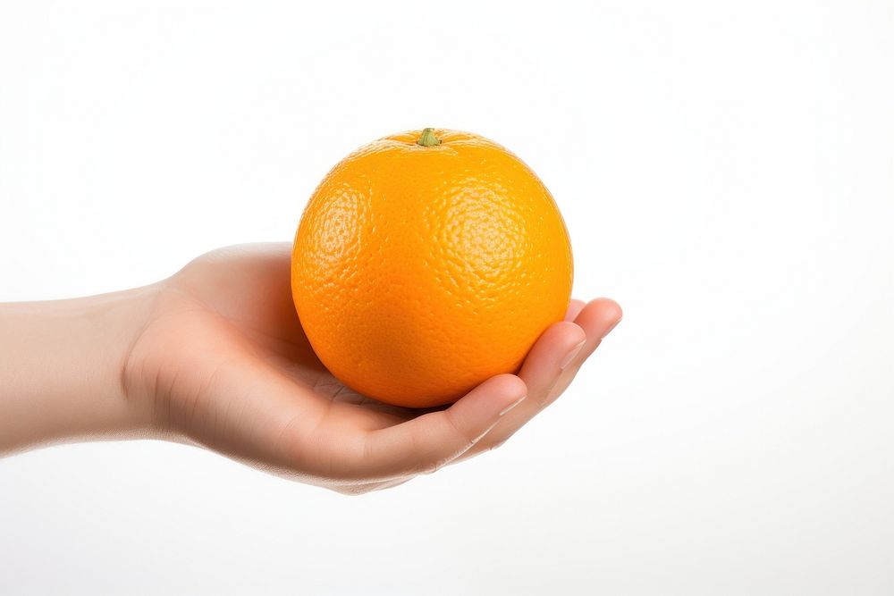 A holding hands holding half an orange grapefruit plant food. AI generated Image by rawpixel.