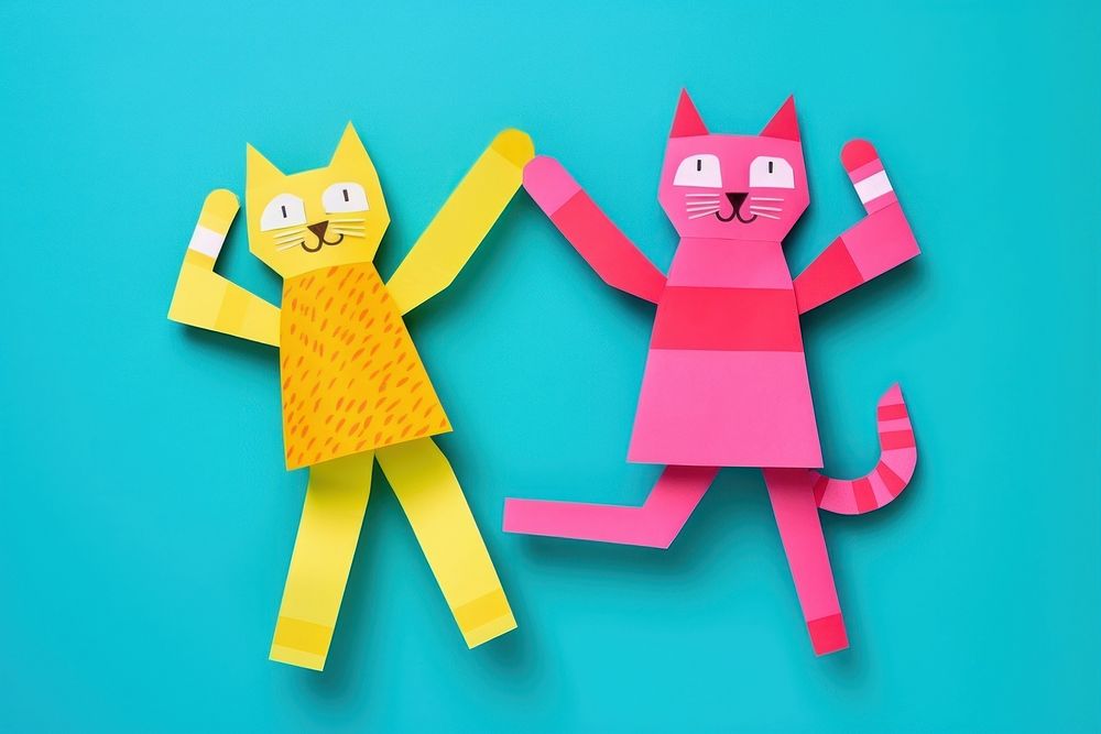 Two cute couple of cat enjoy dancing next to each other art craft paper. AI generated Image by rawpixel.