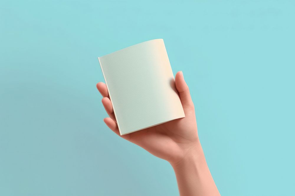 Hand holding book publication technology simplicity. AI generated Image by rawpixel.