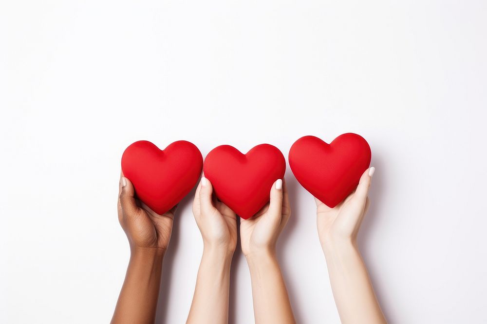 A group of person hands holding red heart shaped white background togetherness celebration. AI generated Image by rawpixel.