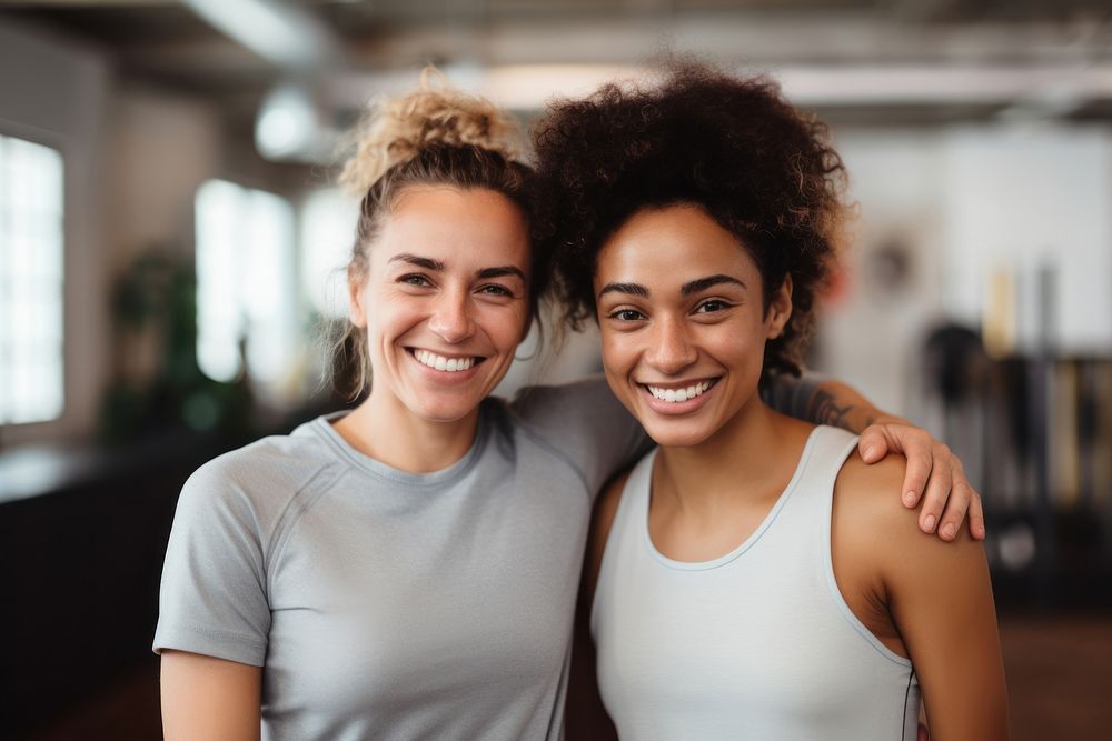 Two diverse young female friends laughing sports smile. AI generated Image by rawpixel.
