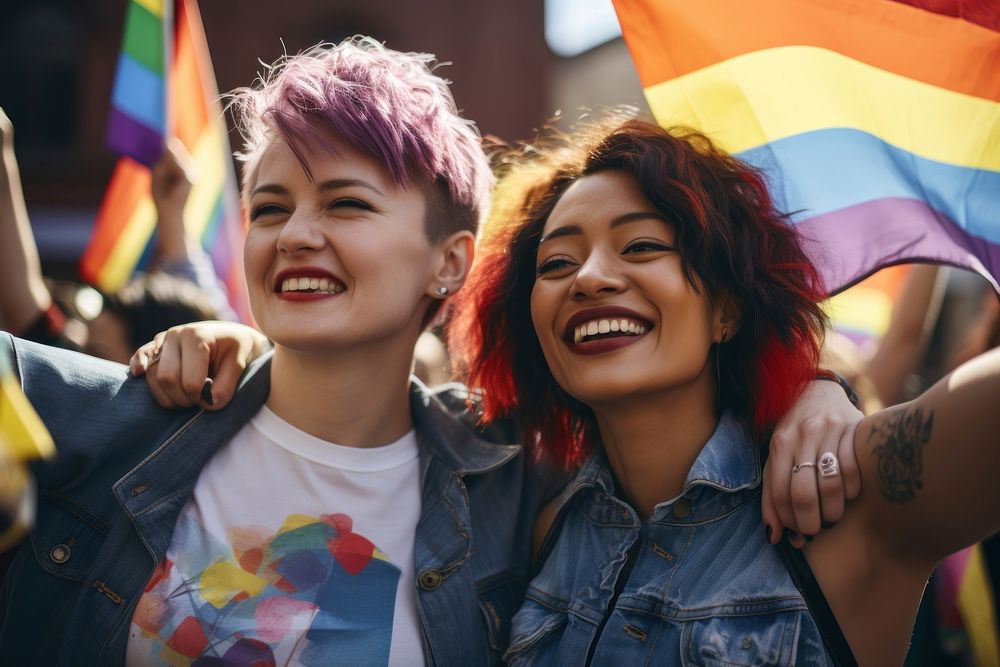 Asian sapphic couple laughing portrait parade. 