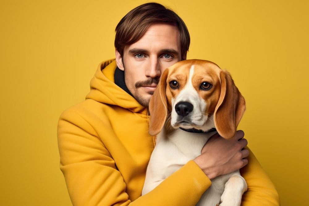 American man hugging beagle pet portrait animal. AI generated Image by rawpixel.