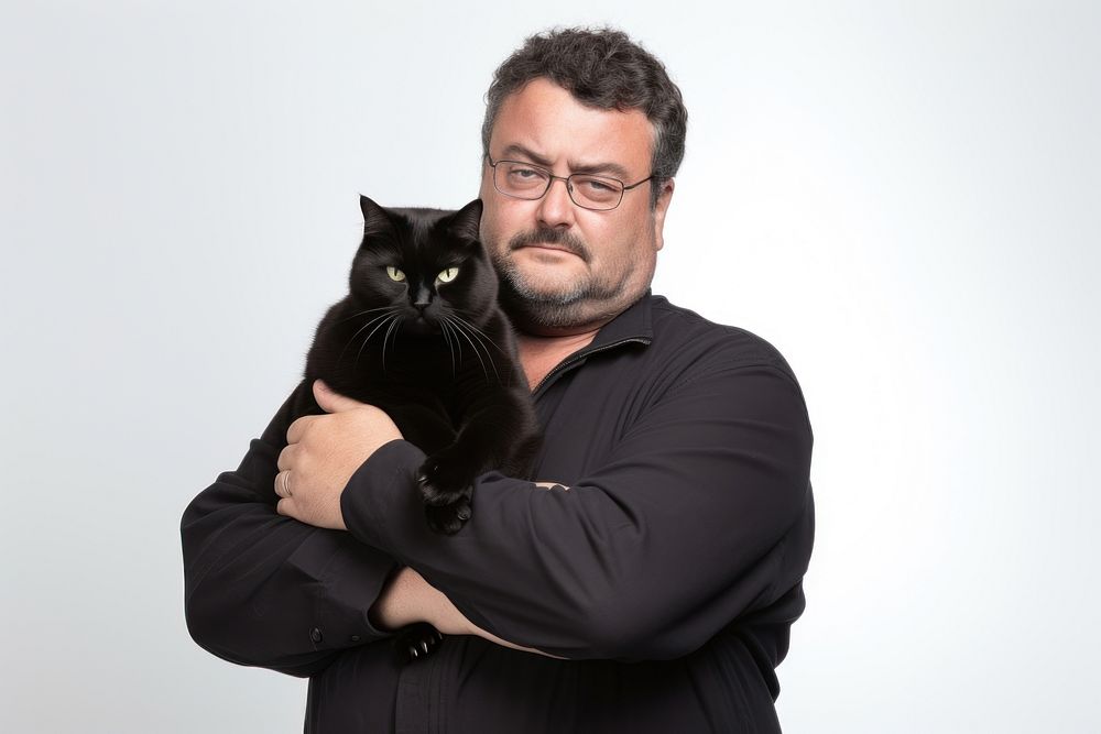 American middle age chubby man hugging black cat pet portrait glasses. AI generated Image by rawpixel.