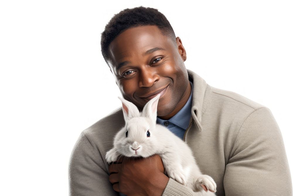 African american middle age man hugging rabbit portrait mammal animal. AI generated Image by rawpixel.