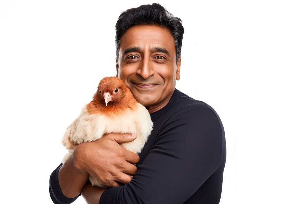 Indian middle age man hugging guinea pig portrait person adult. AI generated Image by rawpixel.