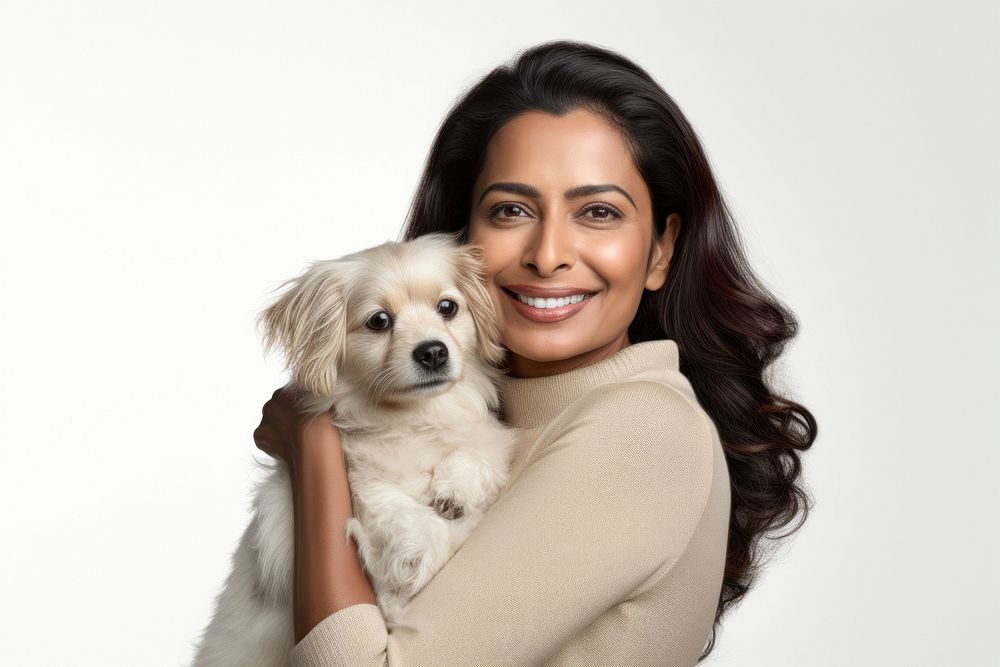 Indian middle age woman hugging rabbit pet portrait looking. AI generated Image by rawpixel.