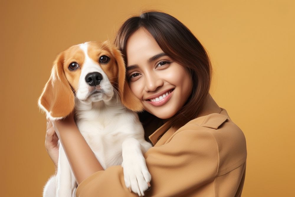 Thai woman hugging beagle pet portrait looking. AI generated Image by rawpixel.
