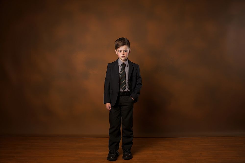 Kid in school uniform portrait standing photo. AI generated Image by rawpixel.