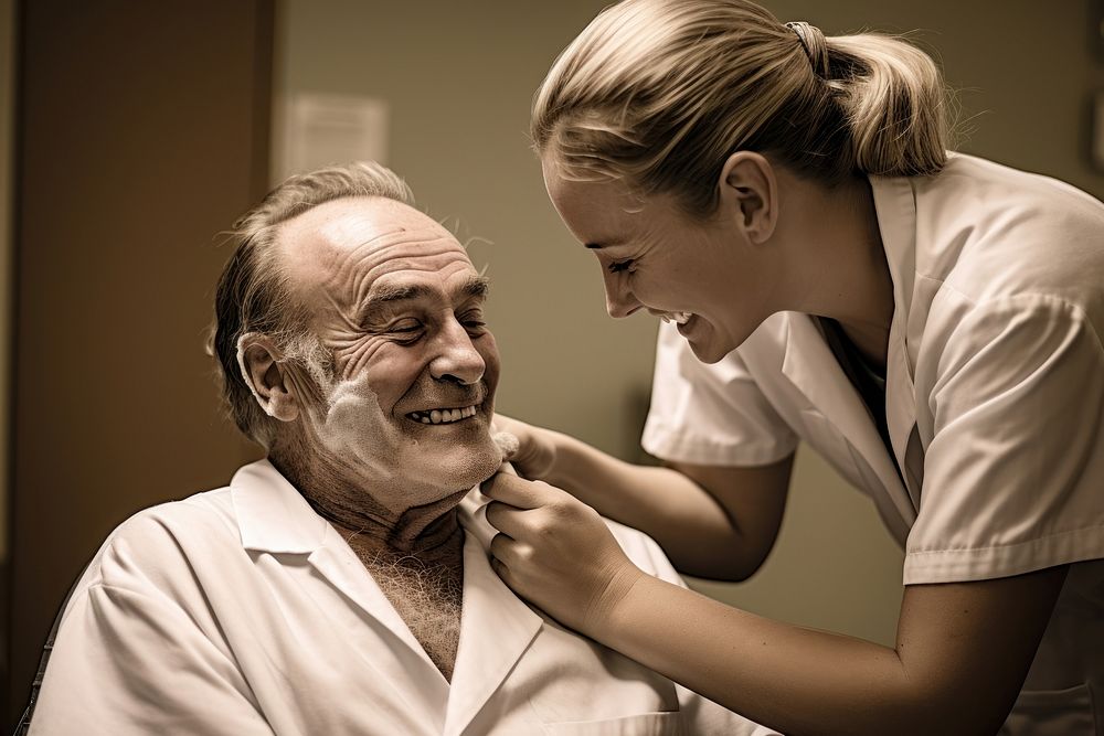 Female healthcare worker assisting senior man in shaving at bathroom hospital female adult. AI generated Image by rawpixel.