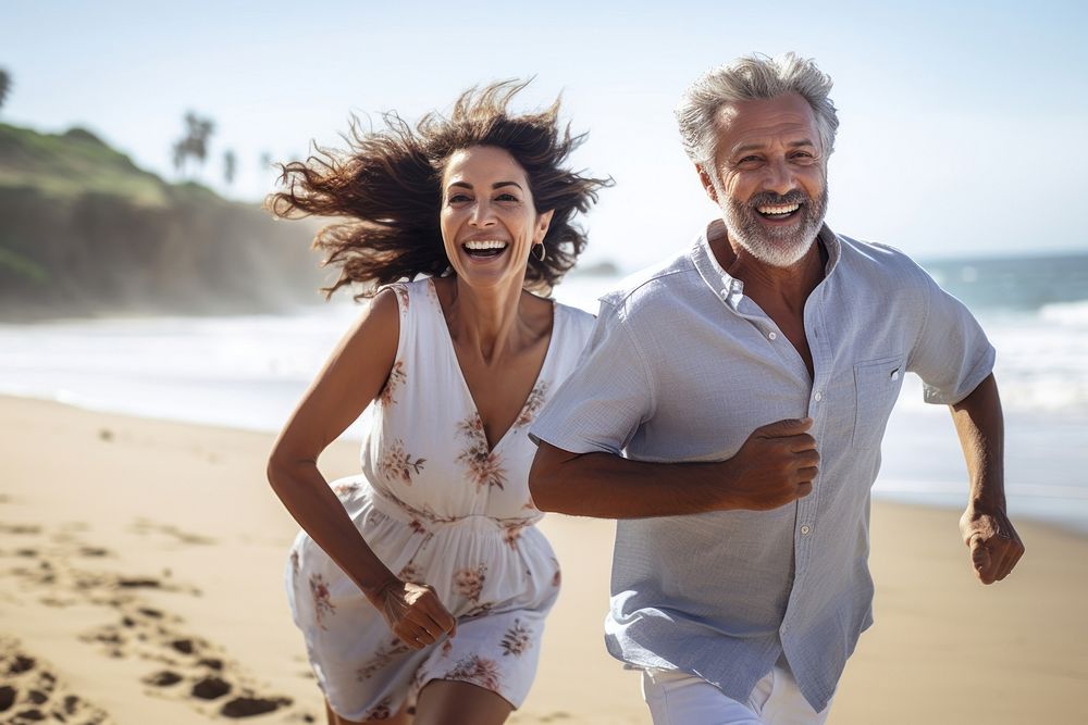 Latina brazillian middle age couple running happily on beach laughing summer adult. AI generated Image by rawpixel.