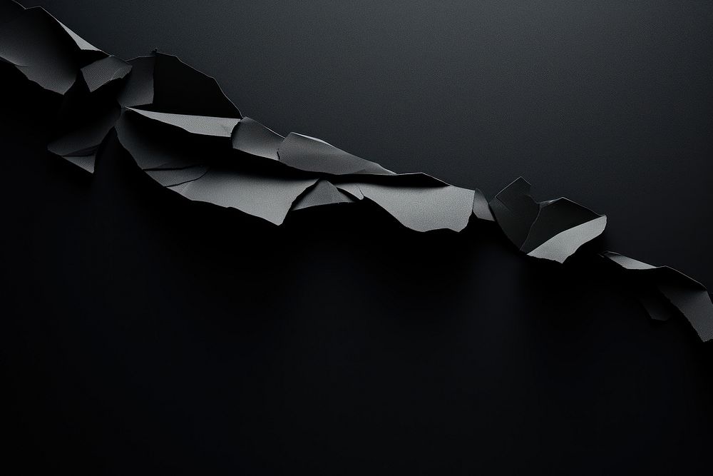 Black torn strip of paper monochrome darkness weaponry. AI generated Image by rawpixel.