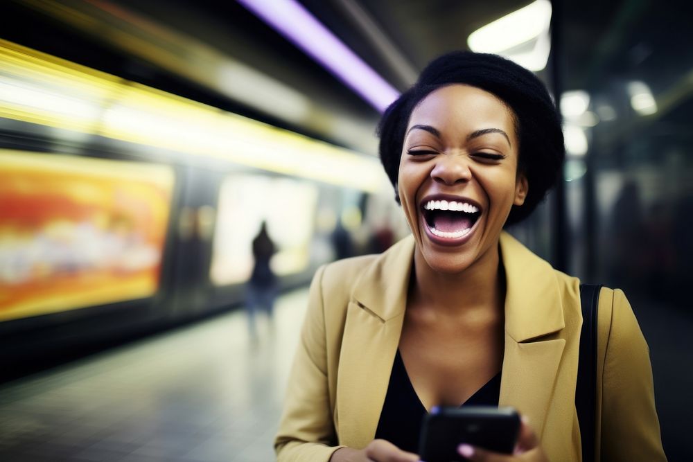 Video chat in smart phone laughing adult subway. 