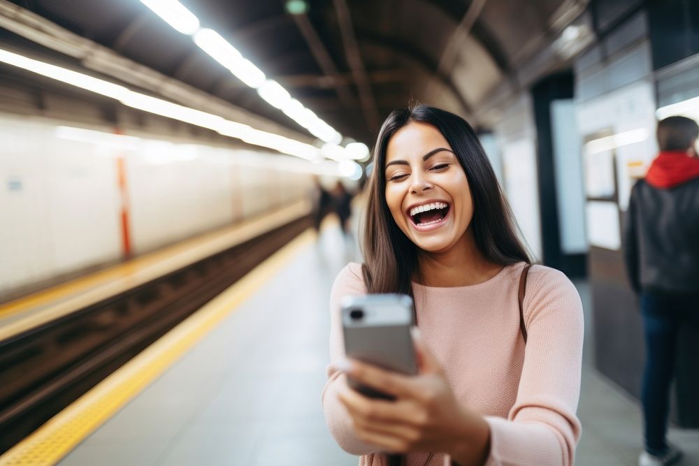 Woman smile during video chat adult laughing subway. AI generated Image by rawpixel.