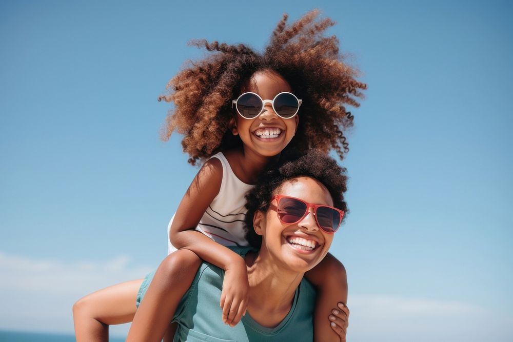 Woman giving a piggyback ride to her girl sunglasses laughing portrait. AI generated Image by rawpixel.