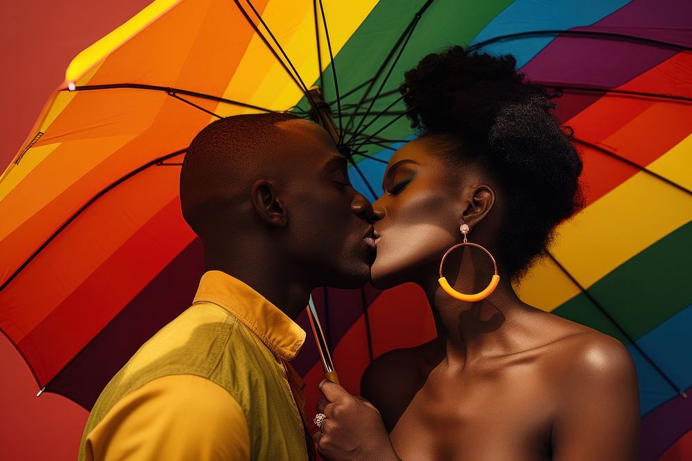Black couple in pride parade portrait kissing jewelry. AI generated Image by rawpixel.