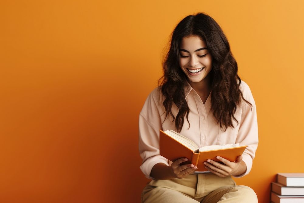 Latina student reading a book university smile adult. AI generated Image by rawpixel.