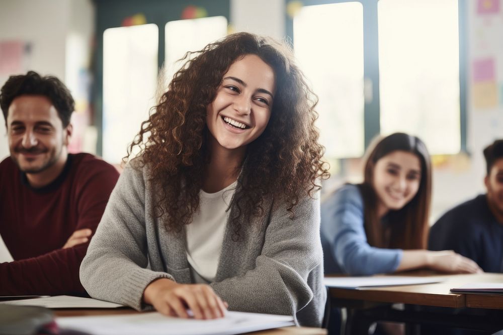 Tutor teaching teenage Hispanic student classroom smiling. AI generated Image by rawpixel.