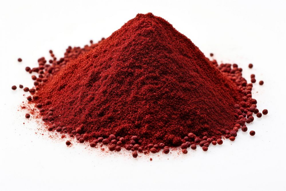 Ground sumac spice powder white background ingredient. 