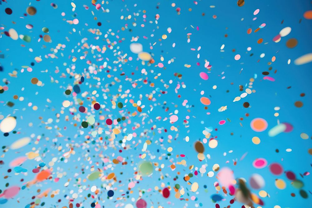 Confetti Against confetti backgrounds celebration. AI generated Image by rawpixel.
