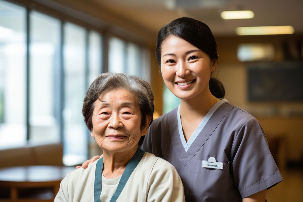 Asian Nurse helping senior woman nurse adult togetherness. AI generated Image by rawpixel.