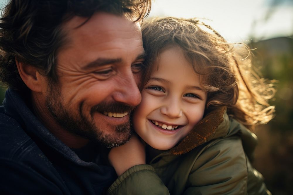 Happy family daughter hugs his dad on holiday photography laughing portrait. AI generated Image by rawpixel.