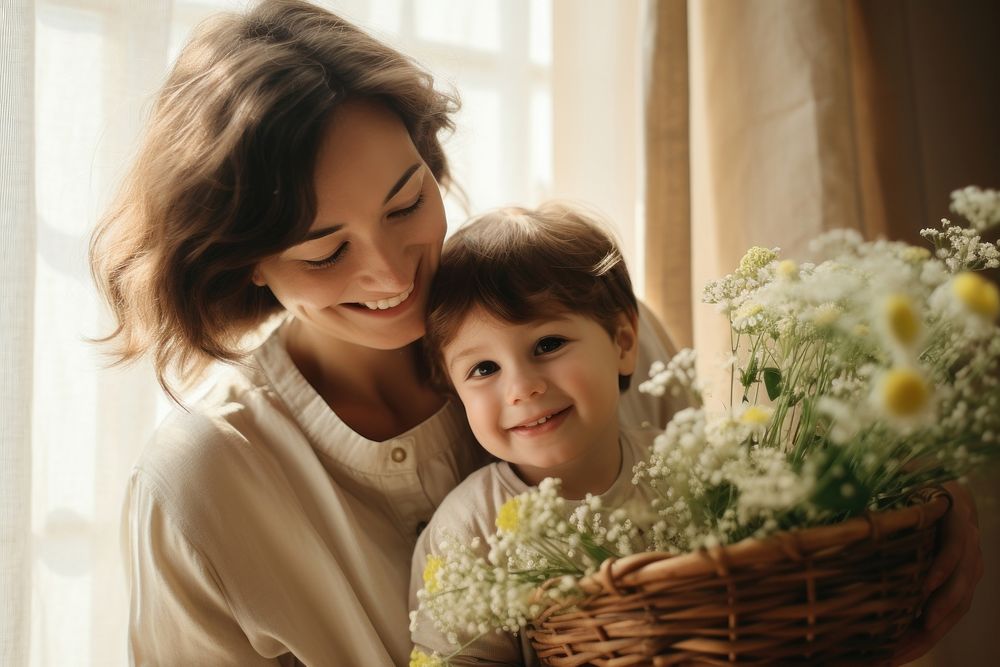 Sweet family of happy mother and little son holding wicker basket photography portrait flower. AI generated Image by…