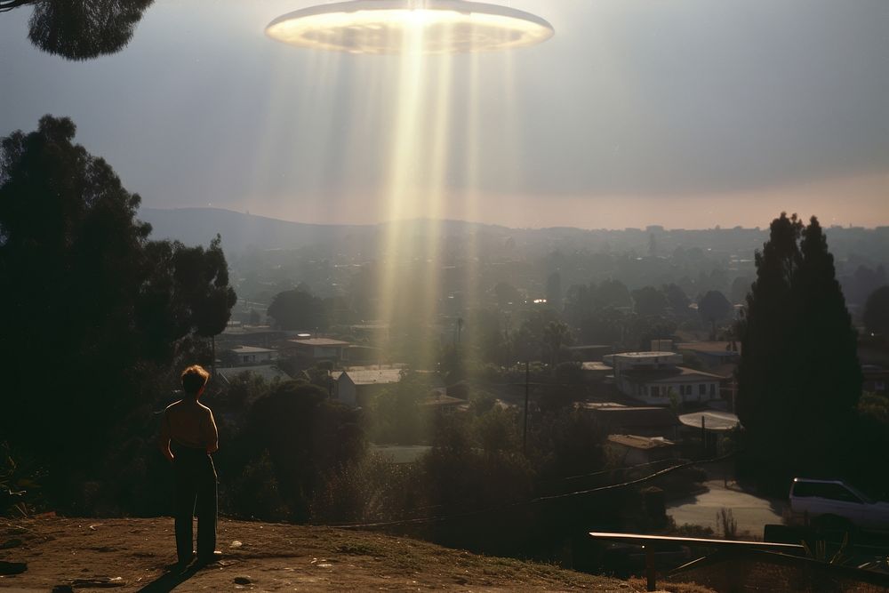 UFO Beaming up photography sunlight outdoors. AI generated Image by rawpixel.