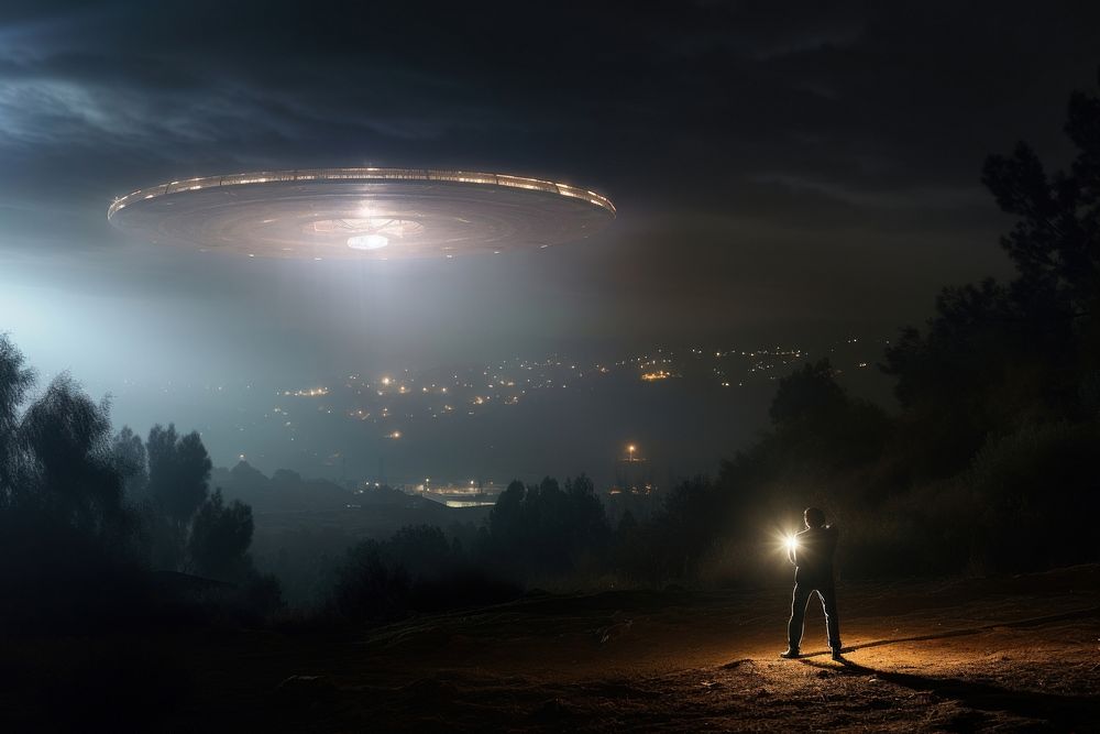UFO Beaming up photography outdoors nature. AI generated Image by rawpixel.
