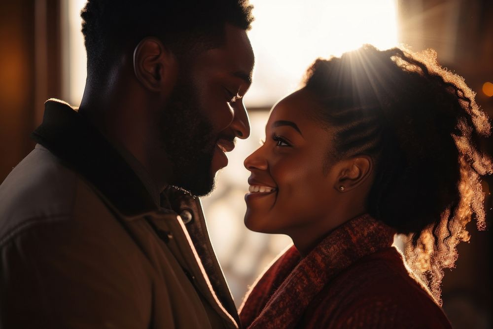 Black couple looking at each other portrait adult photo. 