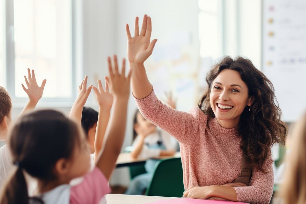 Latin teacher giving high-five to her student classroom school adult. AI generated Image by rawpixel.