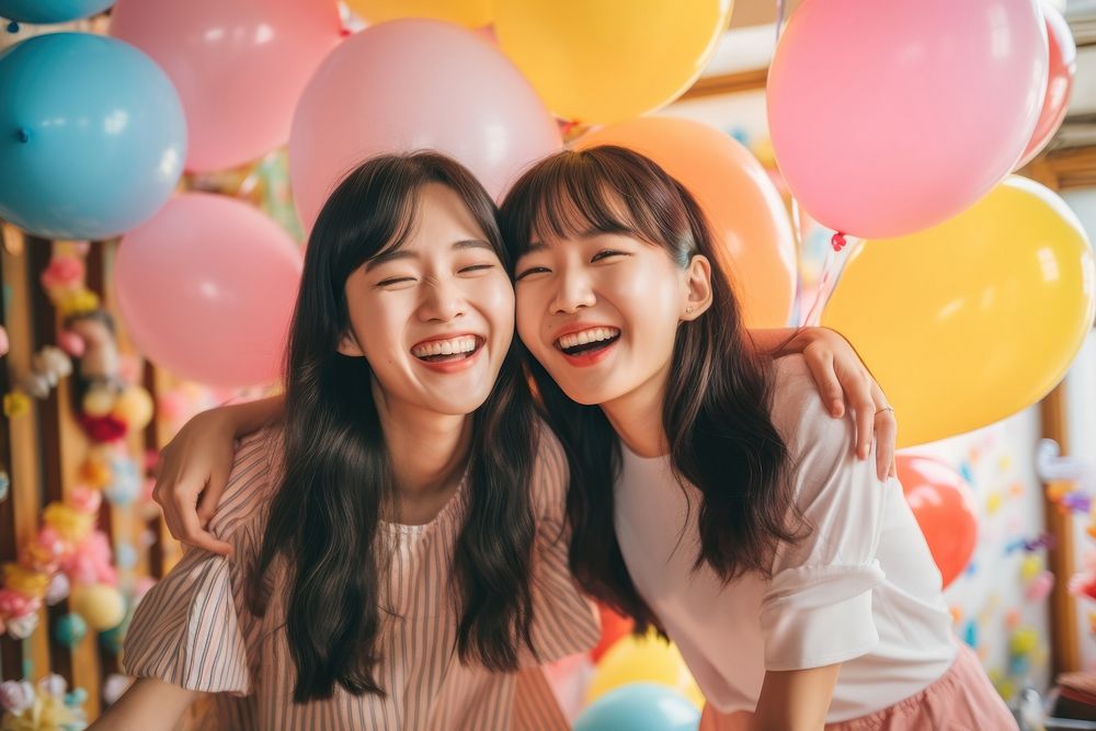 Asian girls having fun at party at home celebration laughing balloon. AI generated Image by rawpixel.