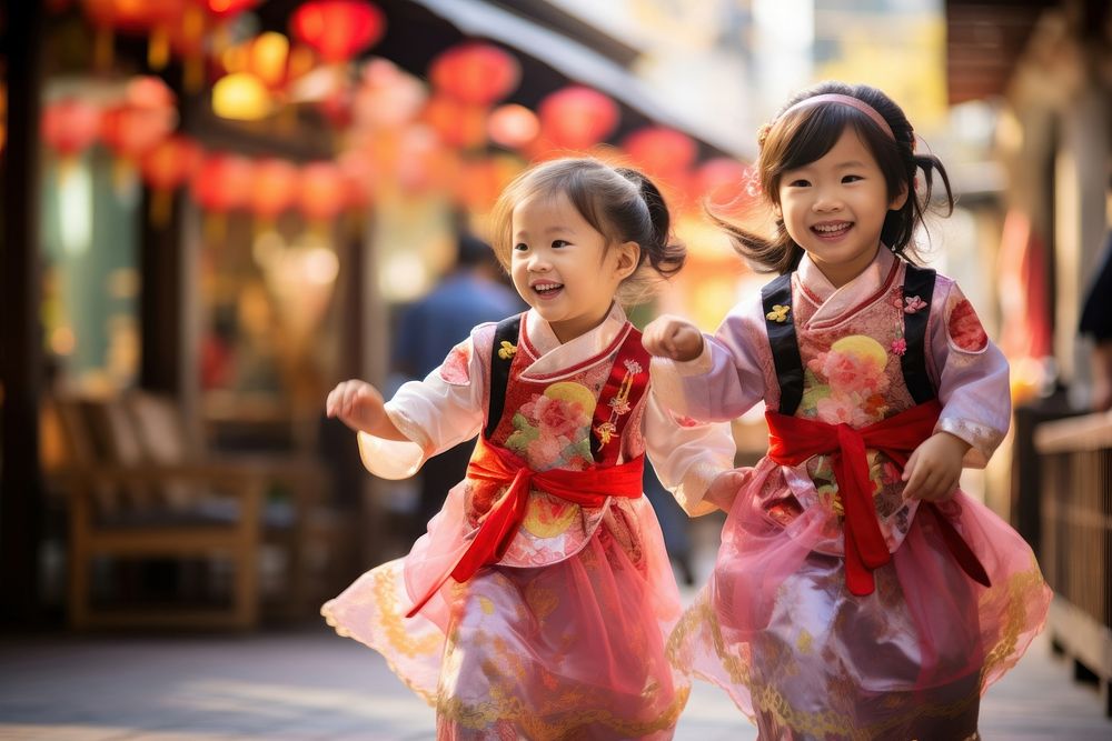 Little girls wearing a traditional chinese dress celebration festival child. AI generated Image by rawpixel.