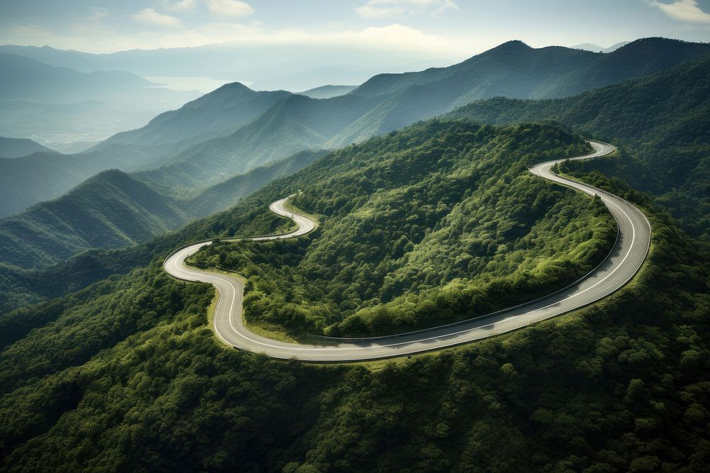 Winding mountain road nature outdoors highway. AI generated Image by rawpixel.