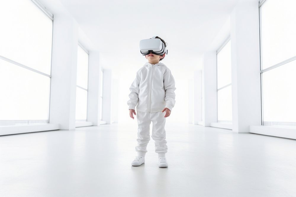 Little boy in virtual reality standing helmet child. AI generated Image by rawpixel.