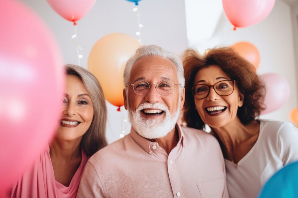 Senior hispanic people balloon birthday laughing. AI generated Image by rawpixel.