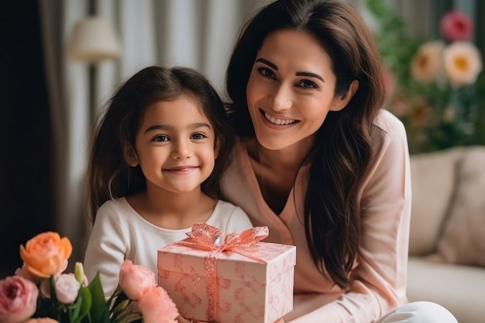 Mum sit with daughter box birthday portrait. AI generated Image by rawpixel.