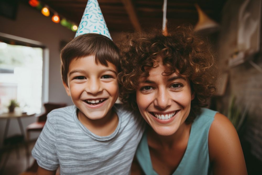 Young boy and mom portrait birthday laughing. AI generated Image by rawpixel.
