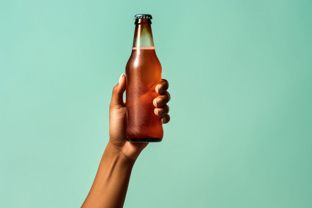 Hand holding beer bottle glass drink condensation. AI generated Image by rawpixel.