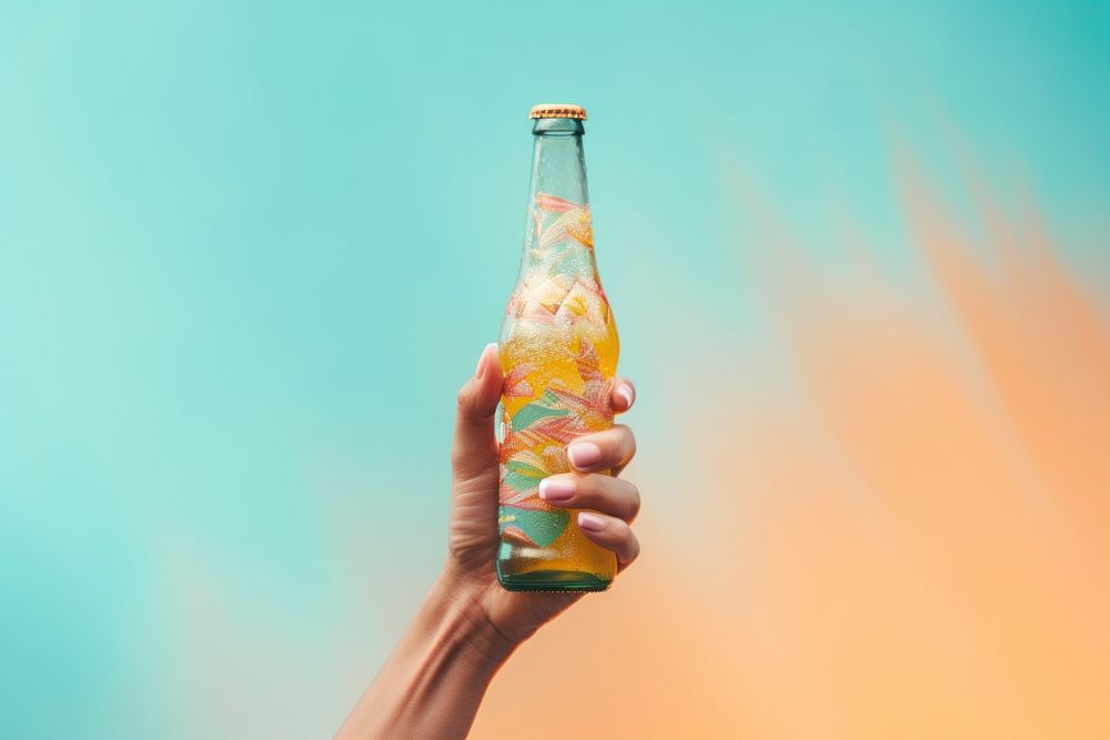 Hand holding craft beer bottle drink refreshment container. AI generated Image by rawpixel.