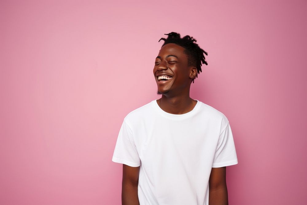 Teenage black boy laughing t-shirt portrait. AI generated Image by rawpixel.