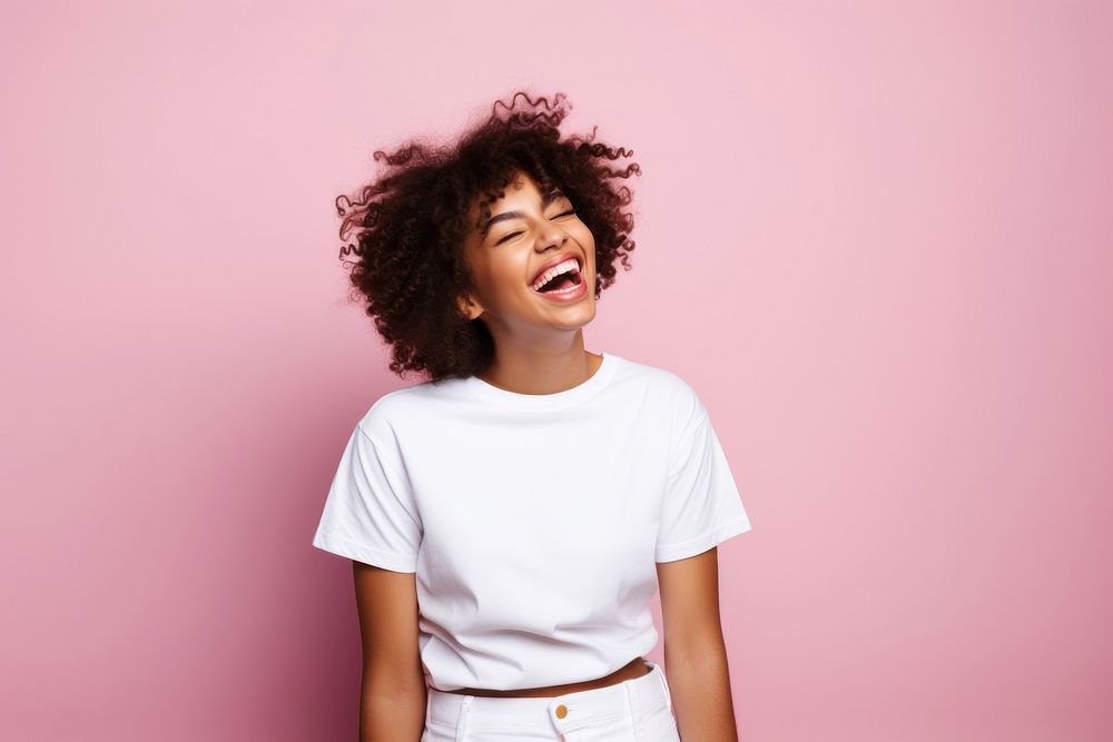 Teenage black girl laughing t-shirt portrait. AI generated Image by rawpixel.